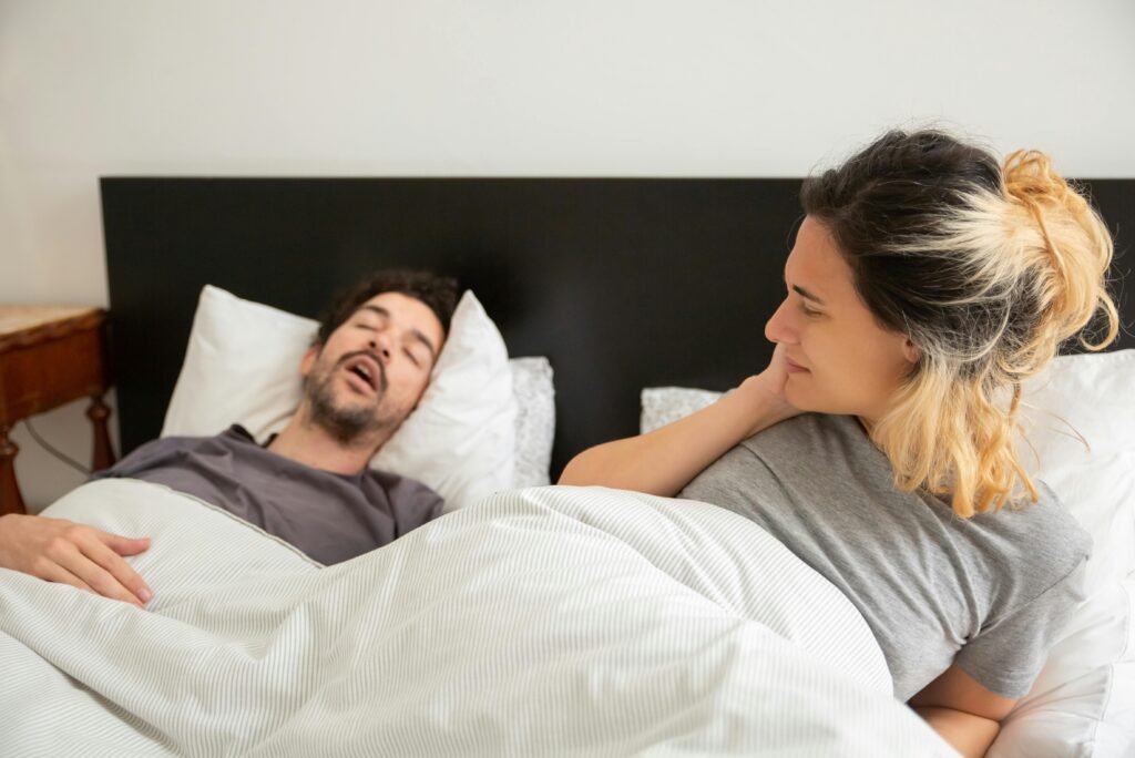 Causes of Tiredness Even After 8 Hours Sleep (And Why Your Body Isn’t Broken) Photo by Kampus Production: https://www.pexels.com/photo/woman-lying-on-bed-with-a-man-7556643/